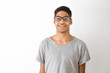 © Oleksandr - Smiling black young man with glasses on a white background. Happy African American guy, student.