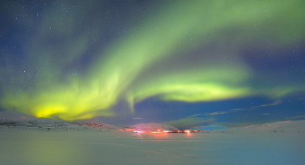 northern lights in the sky over tromso, norway