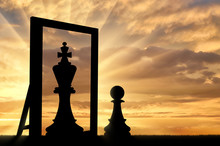 Silhouette Of A Pawn, Sees Himself In The Reflection Of The Mirror Queen.