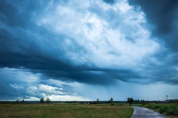 Image of dark Storm clouds in the field