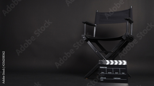 Fotomural Clapper board or movie slate with director chair use in video production or movie and cinema industry