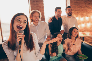 Poster - Close up photo best friends buddies karaoke gathering hang out sing she her ladies soloist he him his guys help yell shout scream words song wear dresses shirts formalwear sit sofa loft room indoors