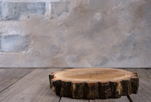 Kitchen Board In The Form Of Logs Stump On The Table