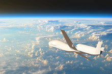 Unmanned Aircraft Flying In The Upper Atmosphere, The Study Of The Gas Shells Of The Planet Earth. Elements Of This Image Furnished By NASA.
