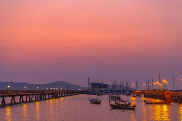 time lapse stunt sunrise Chalong pier. Chalong pier very important for travel business it is a center for all boat .and yacht marina there have two piers for transport service tourists