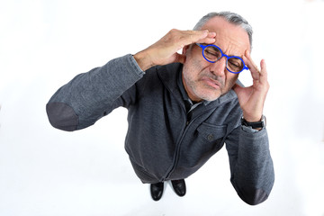 Wall Mural - man with headache on white background