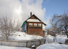 Old Wooden House In Winter Time