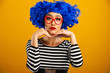 © Mat Hayward - Fun portrait of pretty Asian woman with bright blue wig and red heart shaped glasses