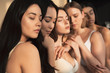 © LIGHTFIELD STUDIOS - selective focus of five multicultural girls with closed eyes in sunlight