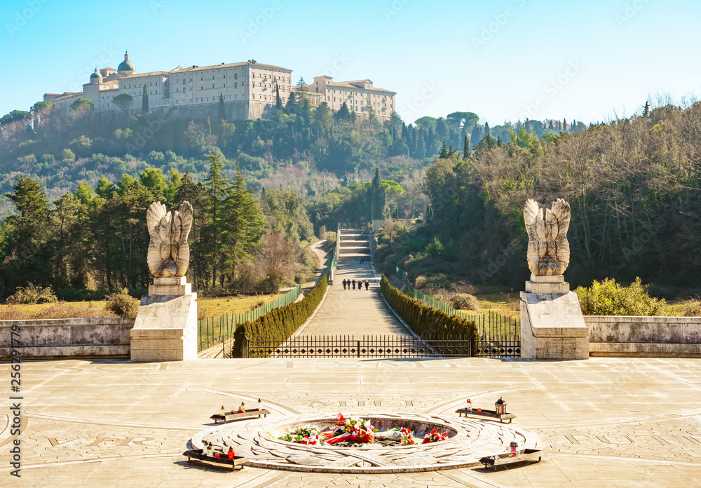 Montecassino (Italy) - The Montecassino Abbey, on Cassino city province of Frosinone, is the first house of the Benedictine catholic Order, by Benedict of Nursia. During World War II it was destroyed  - obrazy, fototapety, plakaty 