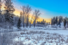 Sunrise On Whitefish River, Montana In Winter On A Cold And Frigid Morning