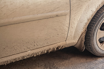 A dirty car after rain