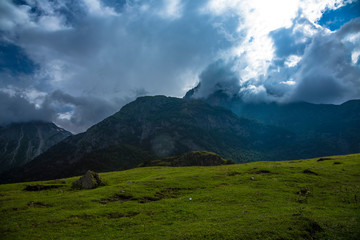 Mountains of the North Caucasus, mountain tops in clouds. Wild nature