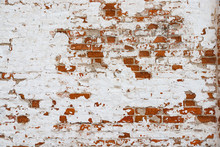 The Texture Of The Old Brick Wall Painted White With Peeling Paint