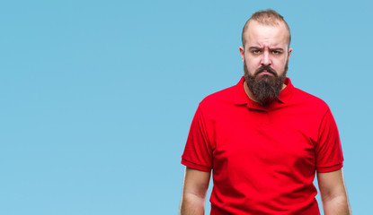 Sticker - Young caucasian hipster man wearing red shirt over isolated background depressed and worry for distress, crying angry and afraid. Sad expression.