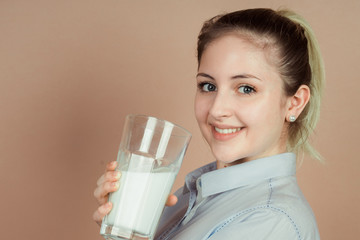 girl drinks milk and is happy