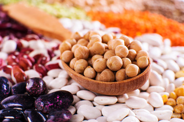 Poster - Grains seed soybeans on wooden spoon with various of legumes