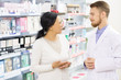 © Nestor - Mature Asian woman shopping pharmacy