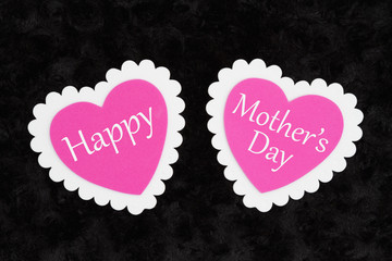 Wall Mural - Happy Mother's Day greeting with white and pink hearts on black