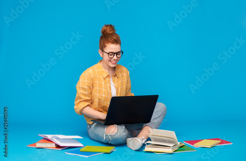 Fotomural education, high school, technology and people concept - red haired teenage stude