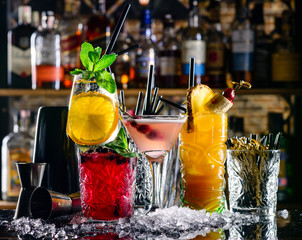 beautiful bright cocktails on the bar in the nightclub