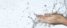 Woman Hand In Water Splash