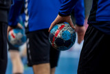 Player holding the ball for handball