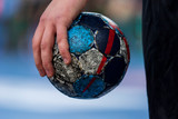 Player holding the ball for handball