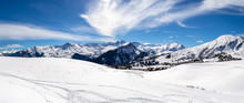 Panoramic Landscape With Mountain Peaks In The French Alps, Above La Toussuire Village, On A Sunny Winter Day, In Les Sybelles Ski Area.