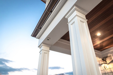 Strong columns and trim of modern home exterior.