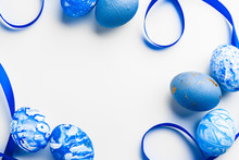 Blue Easter Eggs Isolated On White.