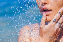 Beautiful Young Woman In Splash Of Water Close Up Sensual Portrait