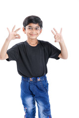 Canvas Print - Indian child showing nice gesture with hand