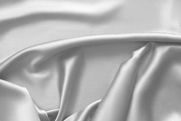 Rippled white silk fabric satin cloth waves background