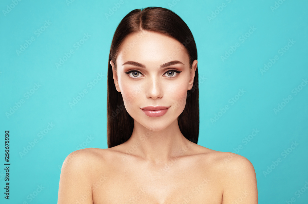 Yong and perfect. Skin care,Beauty treatment and spa concept. Attractive model with brown hair and  Clean Fresh Skin portrait - obrazy, fototapety, plakaty 