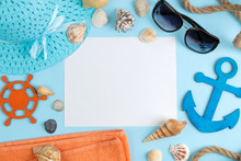 Summer Accessories With Sun Glasses, A Hat, Shells, And A Blank For Text On A Bright Blue Background. Free Space. Top View. Frame