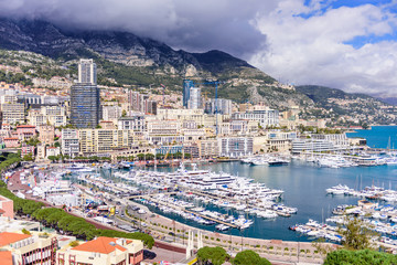 Canvas Print - Cityscape and harbor of Monte Carlo. Aerial view of Monaco on a Sunny day, Monte Carlo, Principality of Monaco