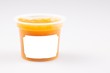 plastic orange pot of peach compote