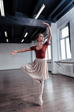 Attractive Graceful Ballerina Dancing In The Studio