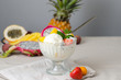 Ice cream with fresh tropical fruits.