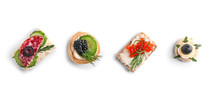 Assortment Of Tasty Canapes On White Background