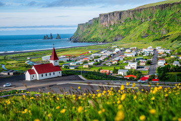 Wall Mural - Beautiful town of Vik i Myrdal in Iceland in summer. The village of Vik  is the southernmost village in Iceland on the ring road around 180 km southeast of Reykjavík.