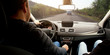 © SkyLine - The young man driving the modern car on asphalt road