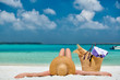 © haveseen - Woman lying down on beach