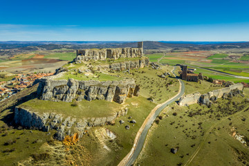 Wall Mural - Atienza aerial panorama with blue sky of medieval ruined castle and town with city walls in Castille and Leon Spain