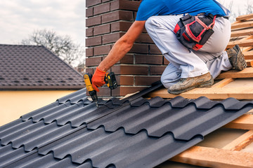 roof master repairs the roof