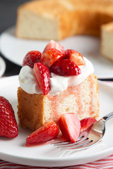 Wall Mural - Angel food cake with whipped cream and strawberries