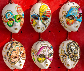 Italy, Venice, carnival 2019, typical Venetian masks and costumes in shop windows and in the street.