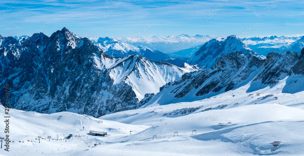 View from the German Zugspitze across the top of a snow mountain landscape - obrazy, fototapety, plakaty 