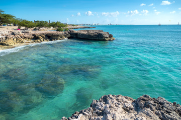 Wall Mural - Transparent water beach on Aruba's coastline. Netherlands Antilles